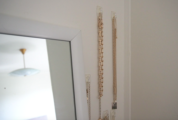 wardrobe organisation - command hooks for hanging necklaces