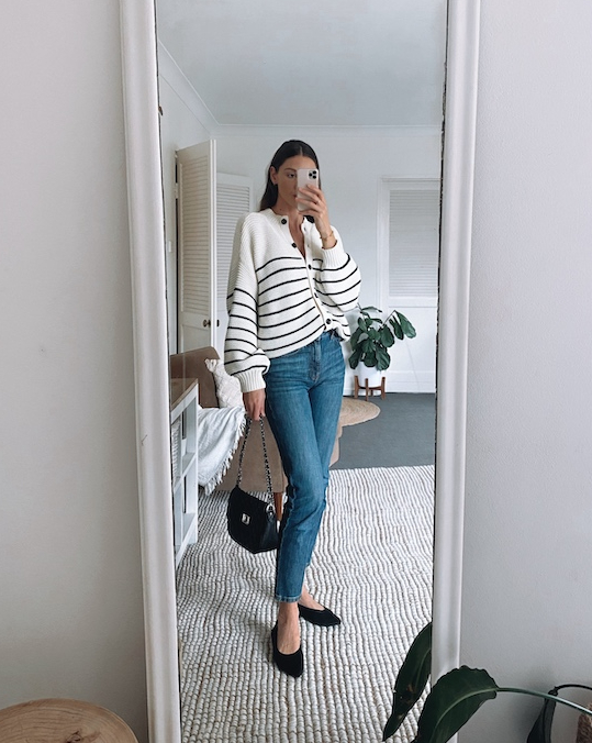 ballet flats outfit french inspired striped sweater and blue jeans